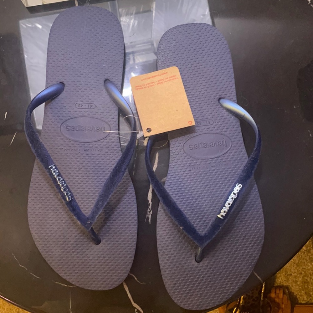 Navy Havaianas. New with tags.